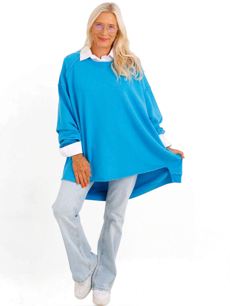 Silberstern Oversize-Sweater CARLY.S in Türkis aus reiner Baumwolle mit Inside-Out-Nähten und Vokuhila-Schnitt