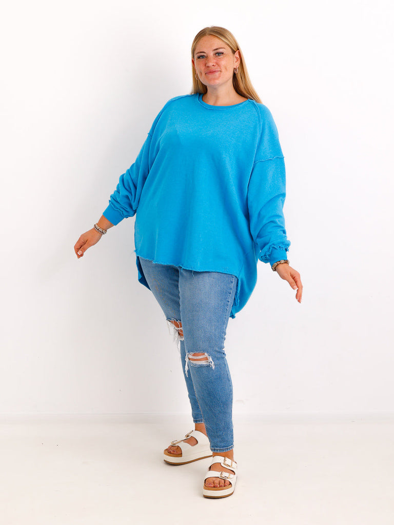 Silberstern Oversize-Sweater Carly.S in Türkis aus reiner Baumwolle mit Inside-Out-Nähten und Vokuhila-Schnitt